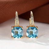 Χρυσά σκουλαρίκια με μυστηριώδεις πέτρες 