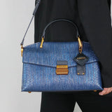 Celeste | Tote Mala Estampado Cobra Relieve Cuero Vegano