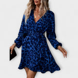 Vestido de leopardo elegante con escote en V y cinturón ajustable